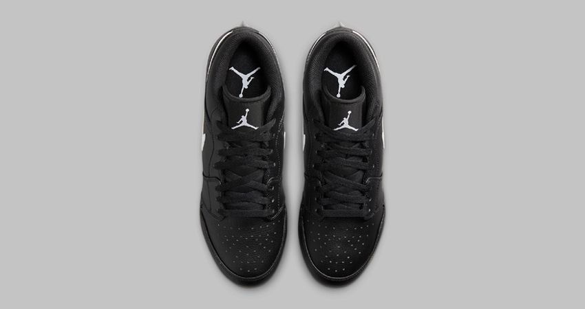 The Air Jordan 1 Low Cleat Sports A Bold White Swoosh up