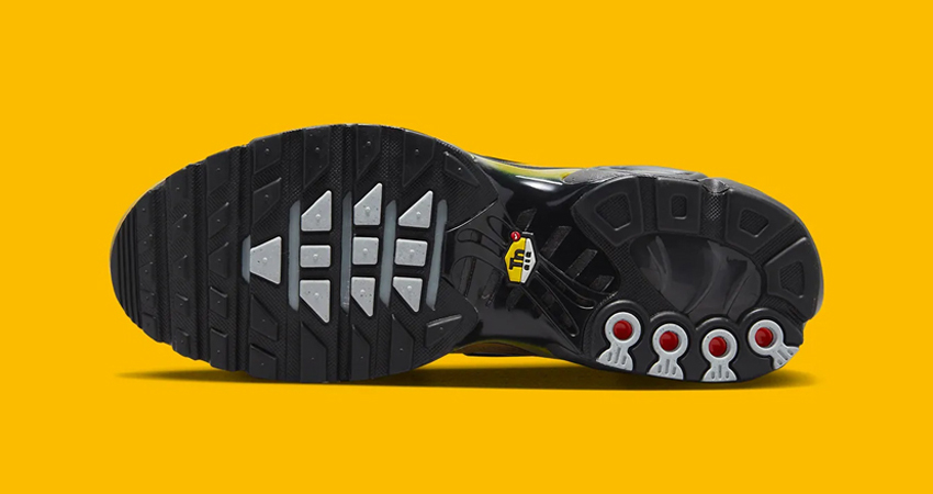 The Nike Air Max Plus Adorns A Black And University Gold Colourway down